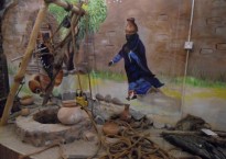 Display in the Fujairah Museum depicts a traditional women at a well to drawn water